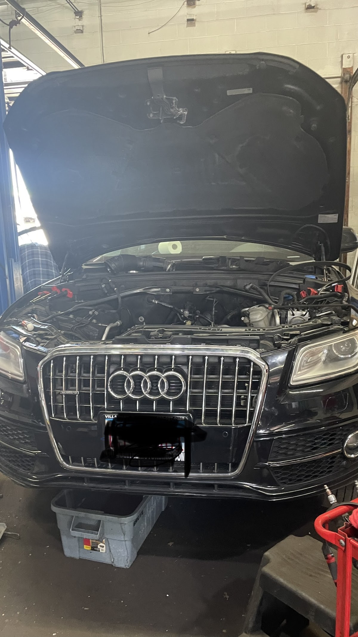 Vehicle being serviced inside Cabrera Auto Repair
